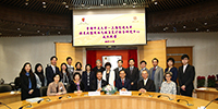 Members of CUHK and SJTU pose for a group photo after the ceremony